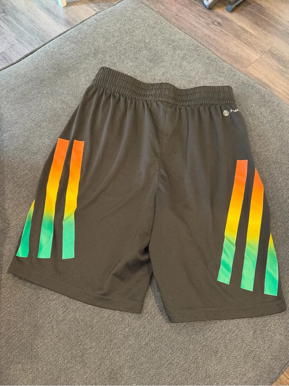 Adidas Black Athletic Shorts with Orange, Yellow, and Green Accents